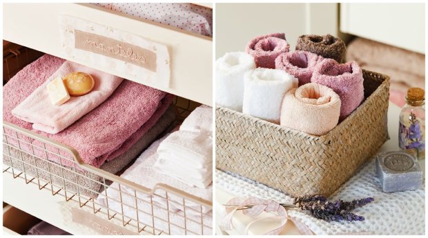 toallas ordenadas en el armario con jabones de olor